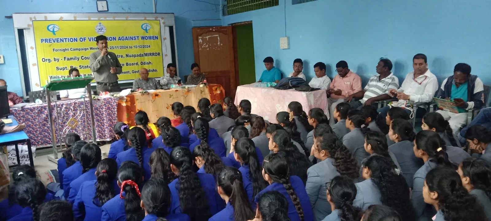 Participants attending a prevention of violence against women programme